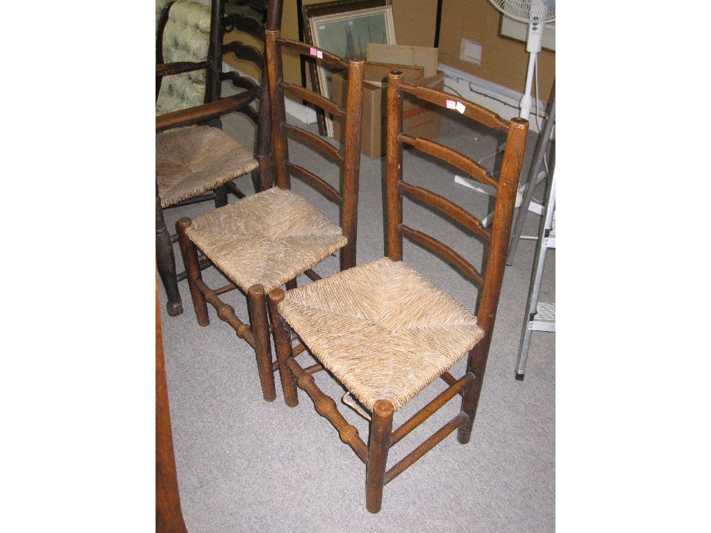 Appraisal: Lot comprising pair of Lancashire ladderback chairs and a similar