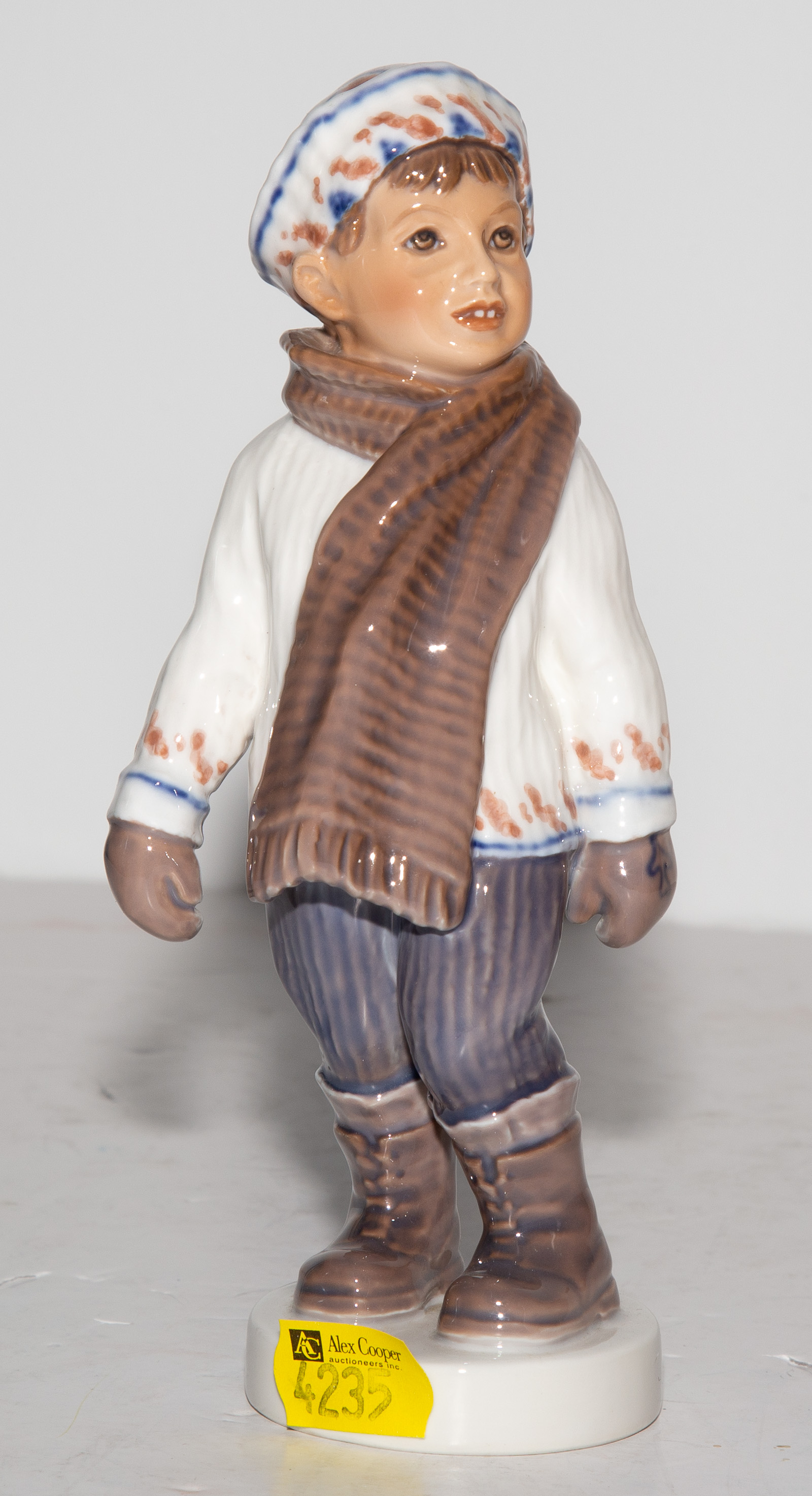 Appraisal: DAHL JENSEN COPENHAGEN PORCELAIN FIGURE Boy in Winter Clothing