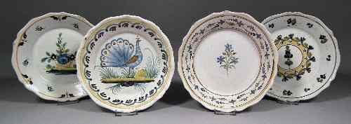 Appraisal: A late th Century French faience shallow dish painted with