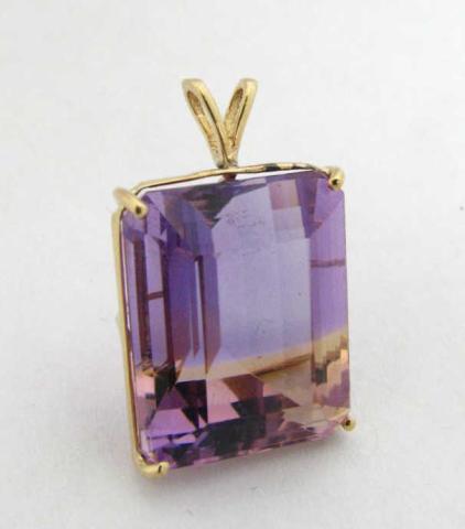 Appraisal: K Yellow Gold Amethyst Pendant with one emerald cut amethyst