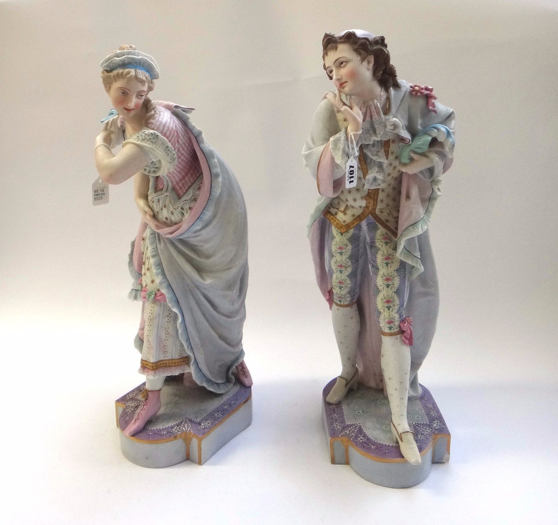 Appraisal: A pair of Continental biscuit porcelain figures late th century