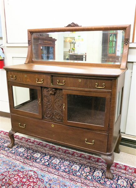 Appraisal: LATE VICTORIAN OAK CHINA BUFFET American c having a mirror