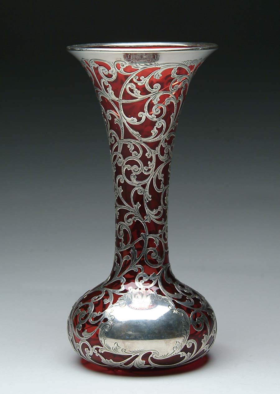 Appraisal: STERLING OVERLAY VASE Beautiful ruby overlay vase has bulbous base