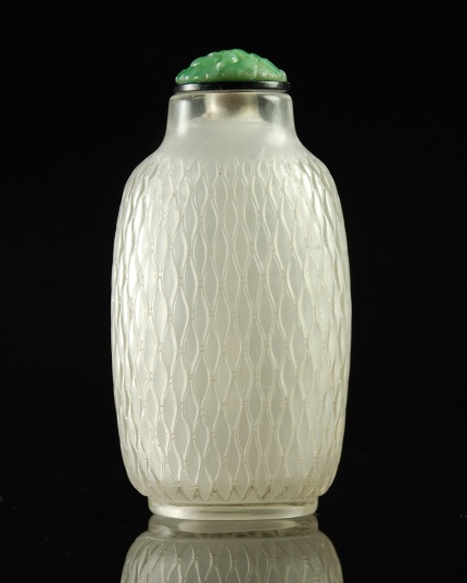 Appraisal: Large bottle with overall carved rice pattern the stone of