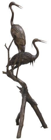 Appraisal: Patinated bronze garden fountain th c modeled as two herons