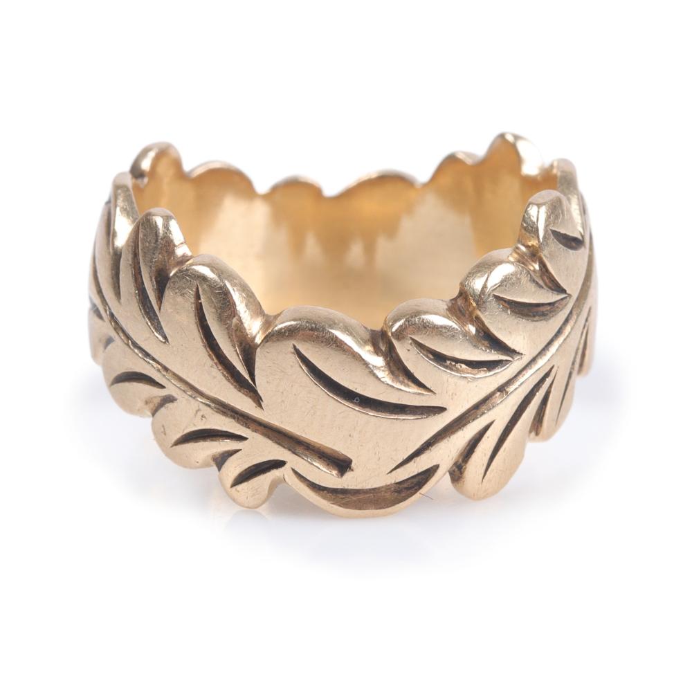 Appraisal: Vintage k yellow gold engraved leaf wedding band statement ring