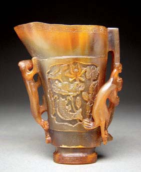 Appraisal: BUFFALO HORN LIBATION CUP Unusual Chinese carved buffalo horn libation