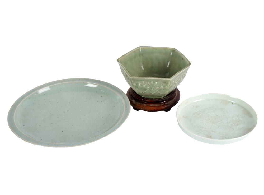 Appraisal: THREE PIECES OF CHINESE CELADON-GLAZED PORCELAINcomprising a plate with flat