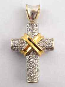 Appraisal: An carat white and yellow gold cross pave set with