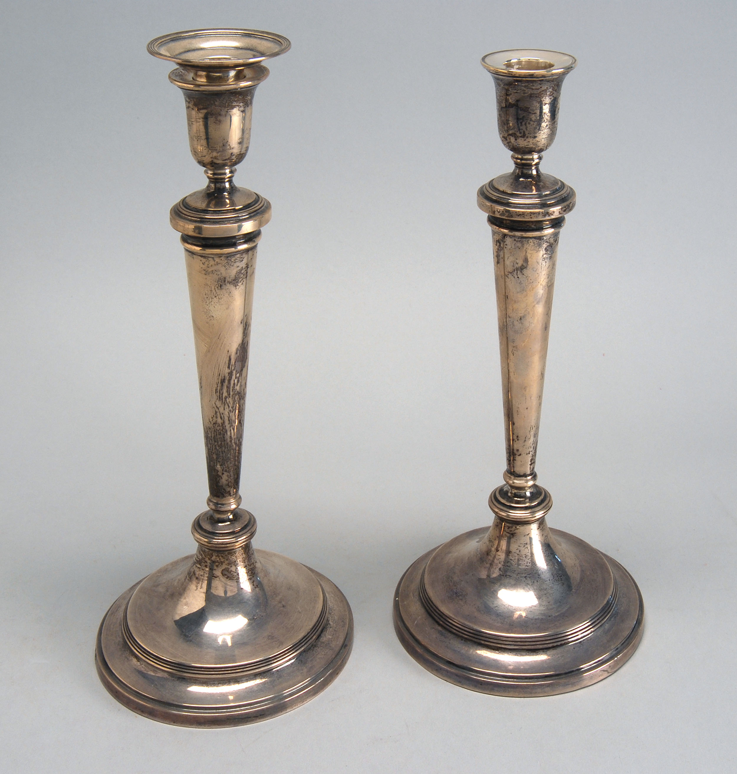 Appraisal: PAIR OF ENGLISH STERLING SILVER WEIGHTED CANDLESTICKS Early th CenturyMade