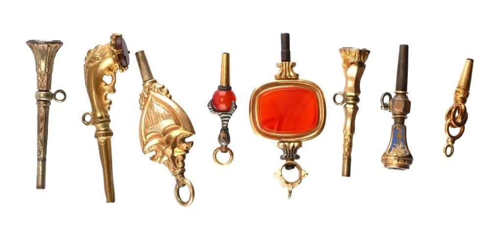 Appraisal: Group of eight figural and fancy pocket watch keys shipping