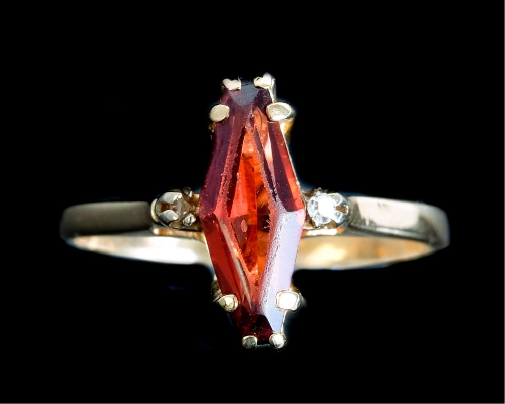 Appraisal: K YELLOW GOLD GARNET DIAMOND RING k yellow gold ring