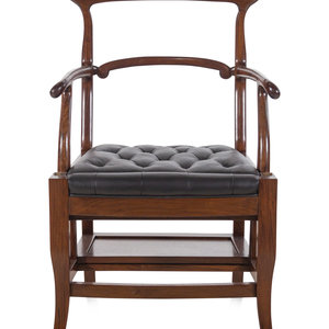 Appraisal: A Mahogany Metamorphic Library Chair th Century with a leather-upholstered