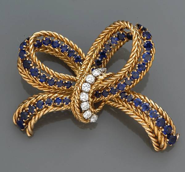 Appraisal: A sapphire and diamond bow brooch G belin signed G