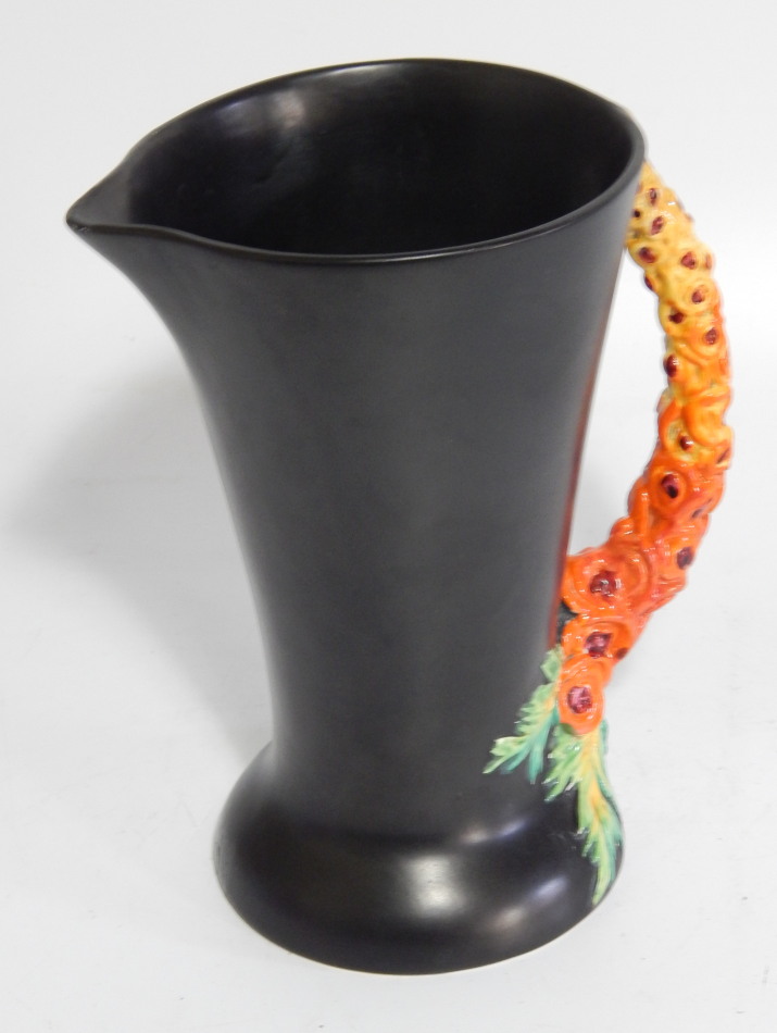 Appraisal: A Clarice Cliff 'My Garden' jug black ground with palm