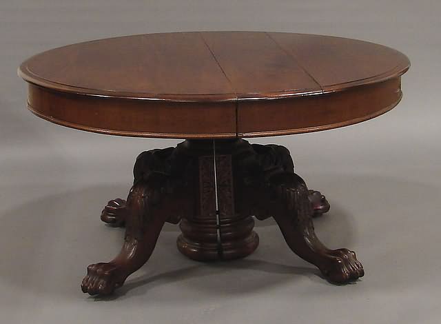 Appraisal: Thumb-molded top massive pedestal with leaf carving acanthus-carved knees and