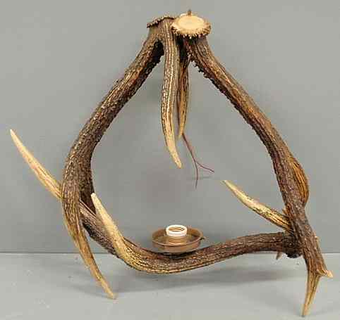 Appraisal: Continental stag horn hanging lamp made from a pair of