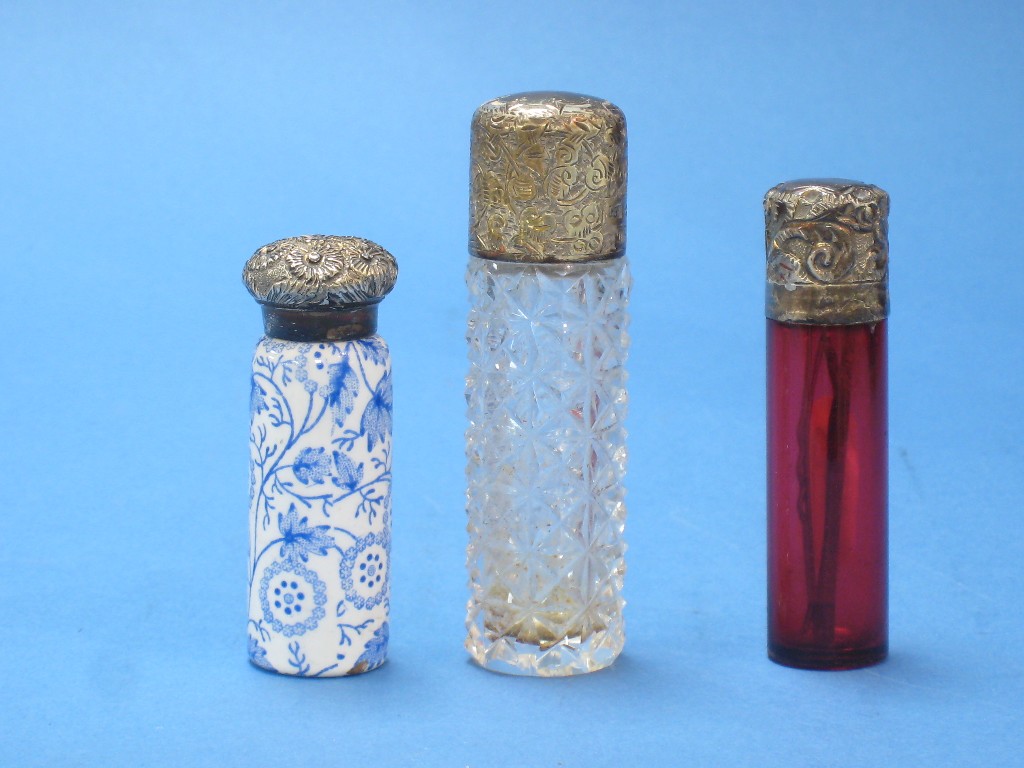 Appraisal: A Victorian silver lidded cylindrical cut glass Scent Bottle Birmingham