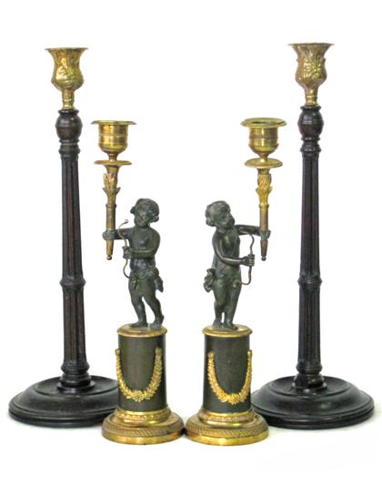 Appraisal: Pair of patinated bronze and brass candlesticks th century