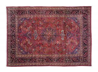 Appraisal: A MASHAD WOOL RUG A MASHAD WOOL RUG th century