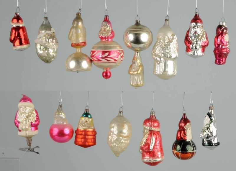 Appraisal: Lot of Blown Glass Santa Ornaments Description A great assortment