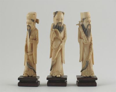 Appraisal: Three Chinese ivory carvings of Daoist Immortals th century cm