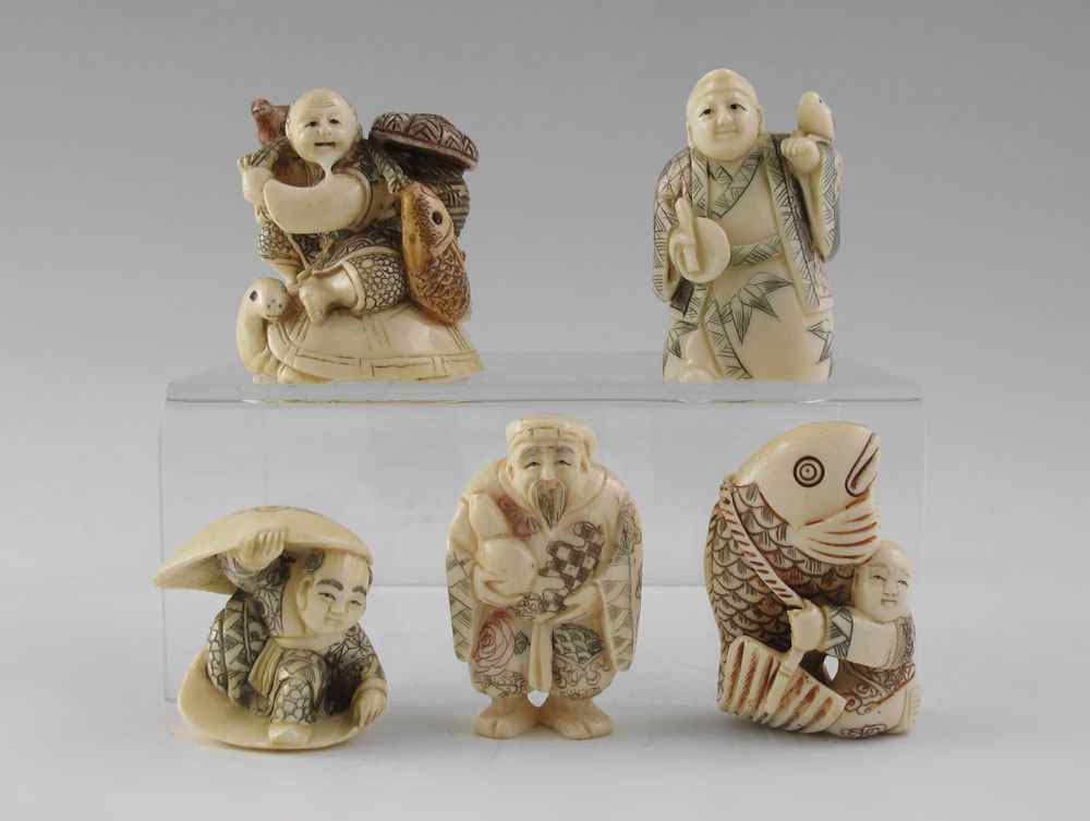 Appraisal: PIECE CARVED IVORY FIGURAL NETSUKE To include Polychrome figural group