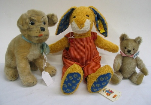 Appraisal: THREE GERMAN STEIFF ANIMALS One is Babyartike a washable rabbit