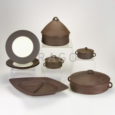 Appraisal: JENS QUISTGAARD DANSK Approximately thirty-three Flame Stone dinnerware pieces including