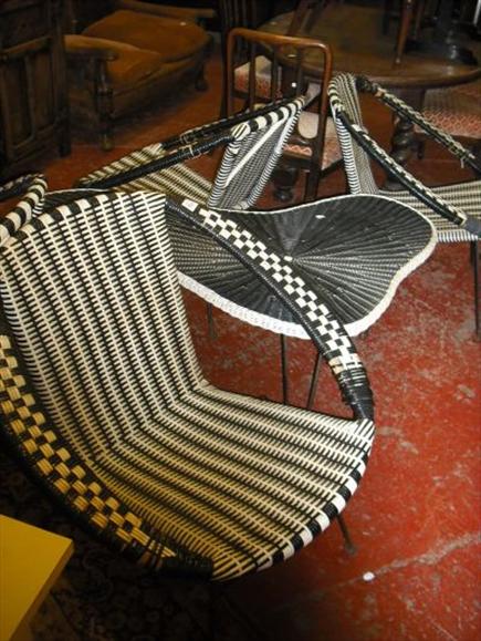 Appraisal: Four matching 's black and white woven garden chairs and