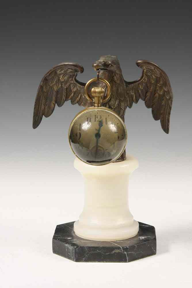 Appraisal: EAGLE FORM DESK CLOCK - Cast Metal Spreadwing eagle on