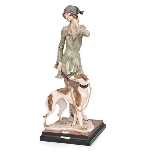 Appraisal: A GIUSEPPE ARMANI COMPOSITE FIGURE OF A WOMAN AND HOUND