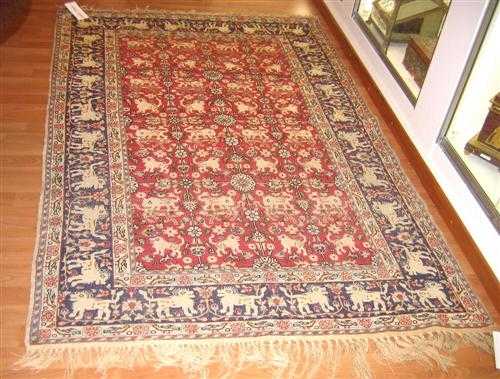 Appraisal: KAYSERI silk old Red central field patterned throughout with white