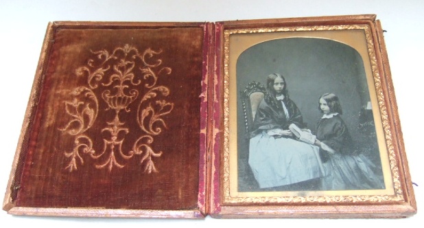 Appraisal: A Victorian daguerreotype style miniature photograph of two young ladies