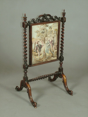 Appraisal: A Victorian mahogany and rosewood firescreen the carved and pierced