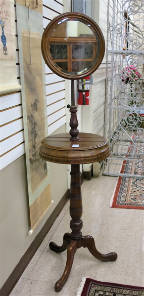 Appraisal: VICTORIAN WALNUT SHAVING STAND English th century featuring a round