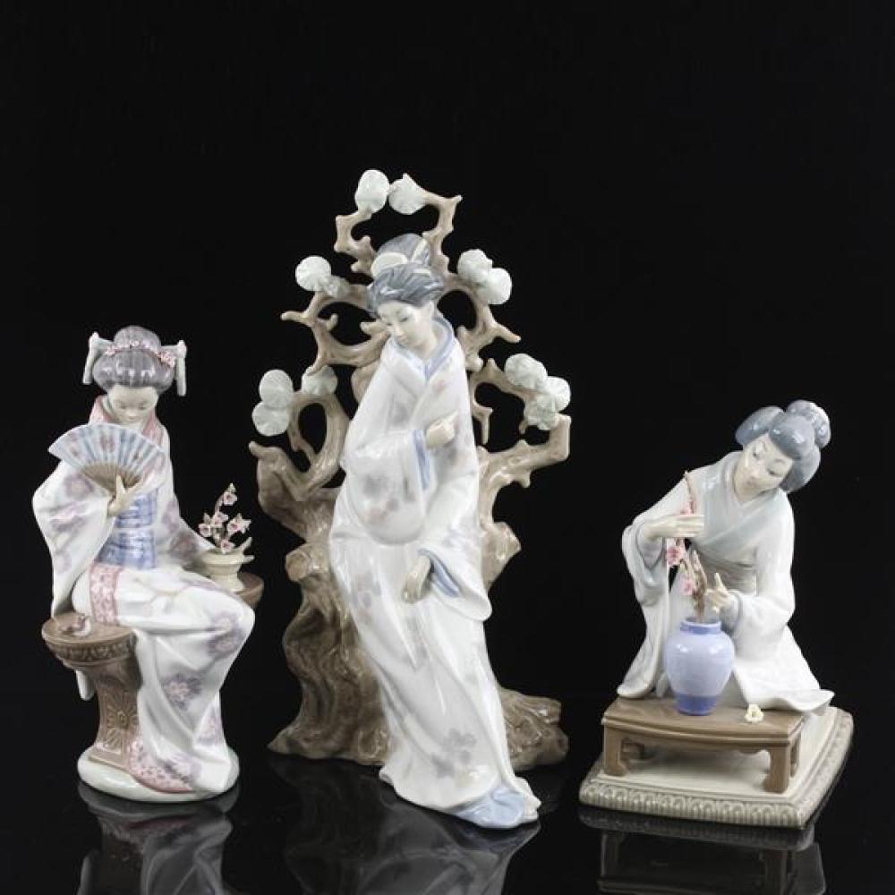 Appraisal: THREE LLADRO PORCELAIN JAPANESE LADY FIGURES Three Lladro porcelain Japanese