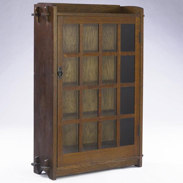 Appraisal: GUSTAV STICKLEY Single-door bookcase no its gallery top and base