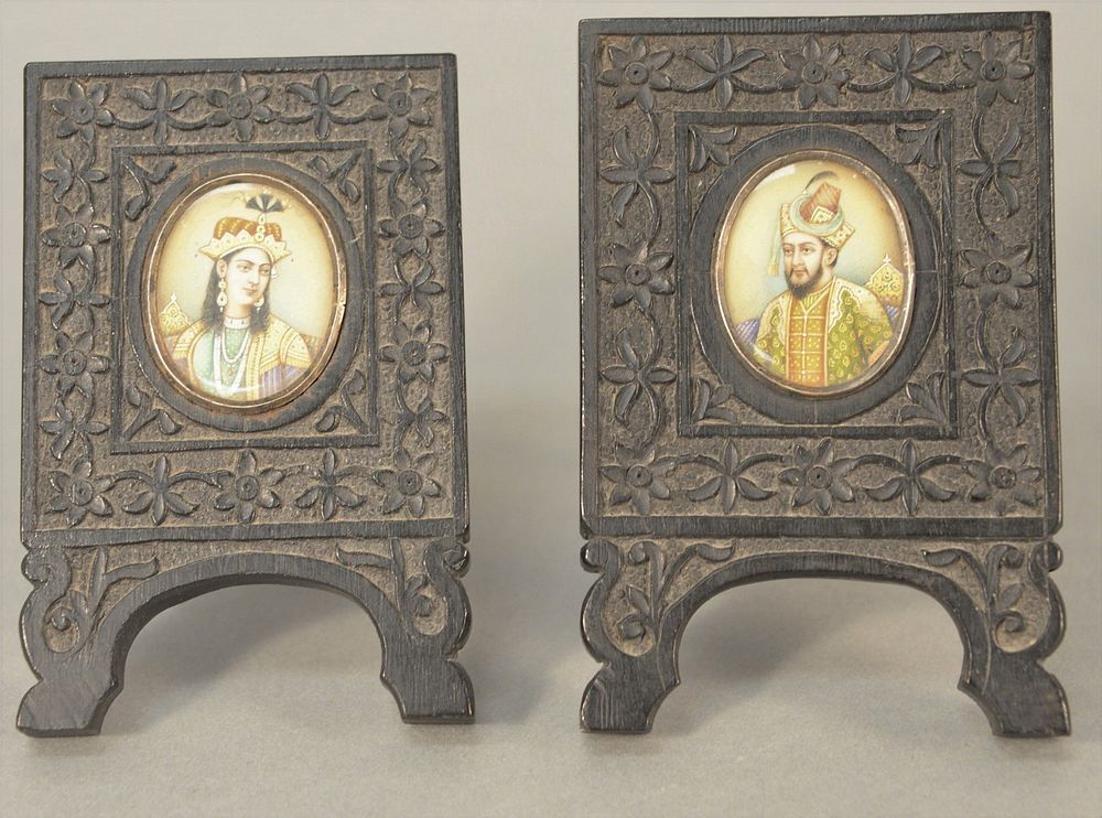 Appraisal: Pair of mid-eastern miniature portraits in carved hardwood frames image