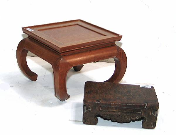 Appraisal: Two wood stands The first of low rectangular form carved