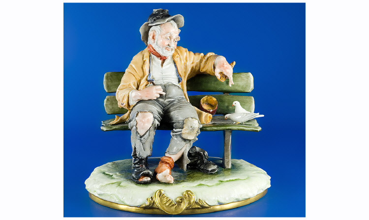 Appraisal: Capodimonte Figure Group Tramp On A Bench Feeding Birds Signed