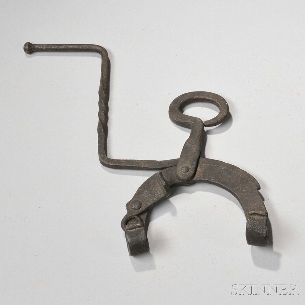 Appraisal: Wrought Iron Kettle Tilter America late th early th century