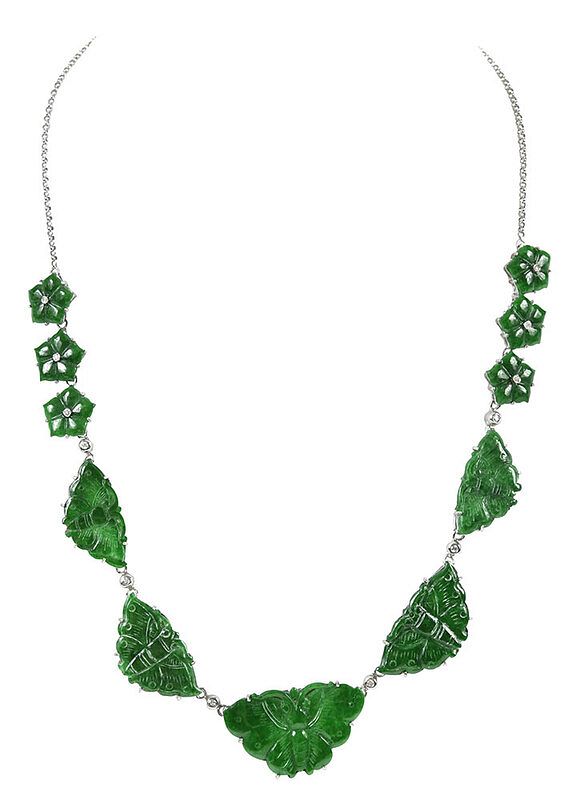 Appraisal: kt Jade and Diamond Necklace carved jade moth and flower