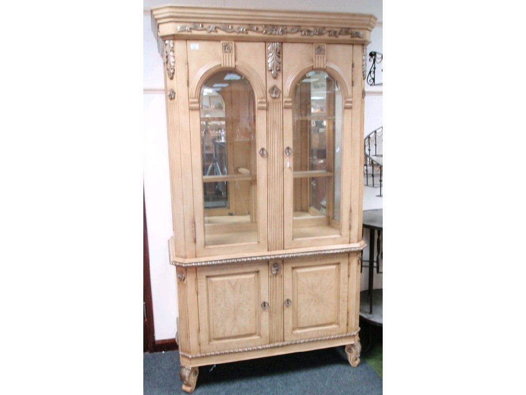 Appraisal: A late thC High Regency style display cabinet enclosed by