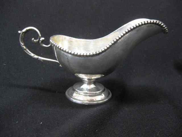 Appraisal: European Silver Sauce Boat pedestal base beaded rim fine ''