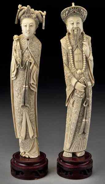 Appraisal: Pr Chinese carved ivory Emperor and Empress International shipping IS