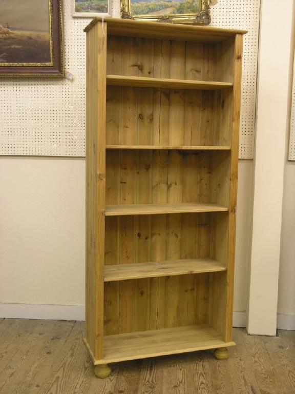 Appraisal: A pair of modern pine open bookcases each with four