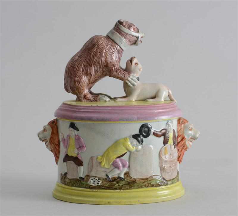 Appraisal: STAFFORDSHIRE PEARLWARE ''BEAR-BAITING'' BOX AND COVER The oval bowl with