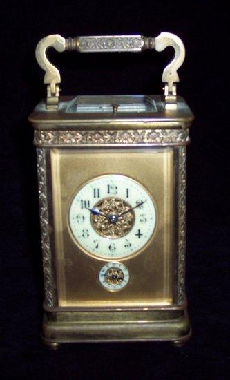 Appraisal: A late th Century gilt brass carriage clock with cream