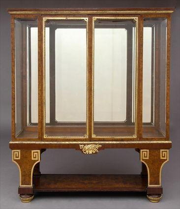 Appraisal: LOUIS XVI-STYLE BURRWOOD VITRINE CABINET The gilt-metal guilloche frieze above